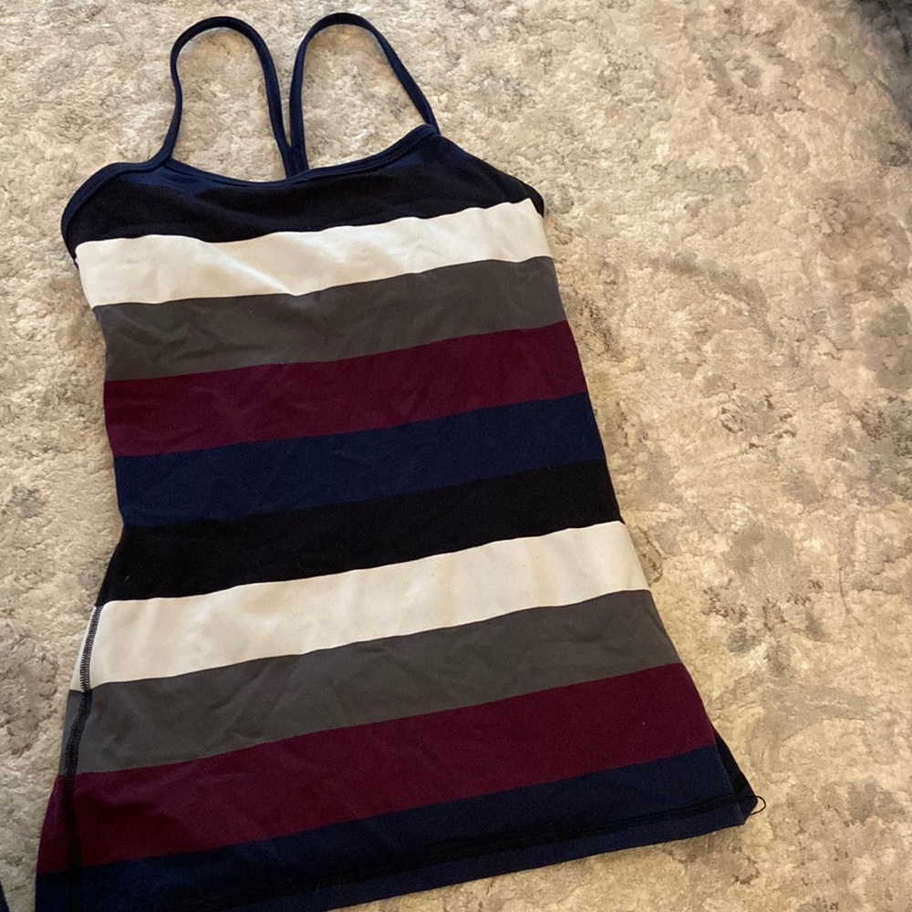 Lululemon tank with built in bra. Size 6. No pads in it.